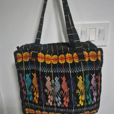 Sale Photo Thumbnail #250: Handmade
Guatemalan
Handmade Guatemalan padded tote bag. Vibrant embroidery, zipped closure this tote bag features a colorful pattern perfect for any occasion. Its unique design adds a pop of color to your outfit.

Condition
Like New
Color
Black
Category
