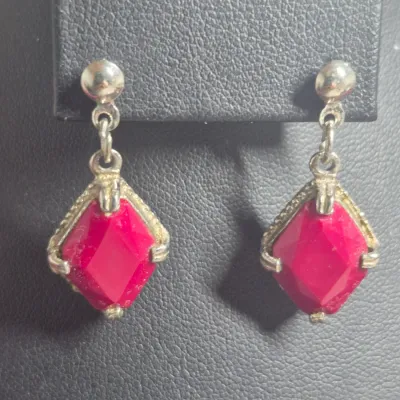 Sale Photo Thumbnail #34: This is a bright pink/magenta beaded necklace and matching earring set featuring vibrant round beads, silver-tone diamond-shaped drop earrings with matching stones, and accent beads
> second earring set is a butterfly w/rhinestones.....for that Fun Evenin