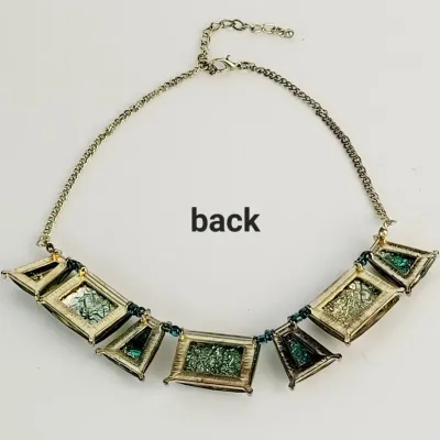 Sale Photo Thumbnail #208: Gold Tone Woman Abstract Green Foil Art Fashion Bib Necklace Jewel

Approx; 19 in.,.....excellent shape, no damage or cracks
