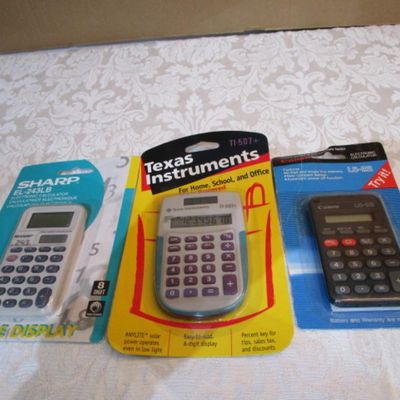 Sale Photo Thumbnail #269: 1 Cannon LC-22 (battery operated), 1 Texas Instruments TI507+, 1 Sharp EL-243LB, see pictures