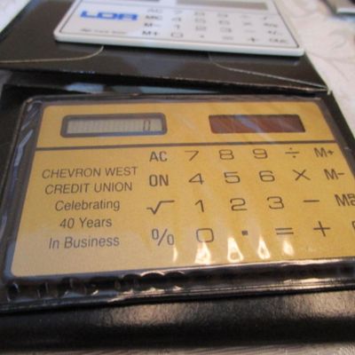 Sale Photo Thumbnail #277: 6 new solar credit card calculators with cases, 2 PF calculators, 1 Elsemate has a stopwatch, calculator & alarm (needs battery), Sharp EL8140 wallet calculator needs battery), see pictures