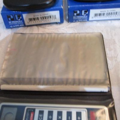 Sale Photo Thumbnail #282: 6 new solar credit card calculators with cases, 2 PF calculators, 1 Elsemate has a stopwatch, calculator & alarm (needs battery), Sharp EL8140 wallet calculator needs battery), see pictures