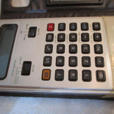 Sale Photo Thumbnail #284: 6 new solar credit card calculators with cases, 2 PF calculators, 1 Elsemate has a stopwatch, calculator & alarm (needs battery), Sharp EL8140 wallet calculator needs battery), see pictures