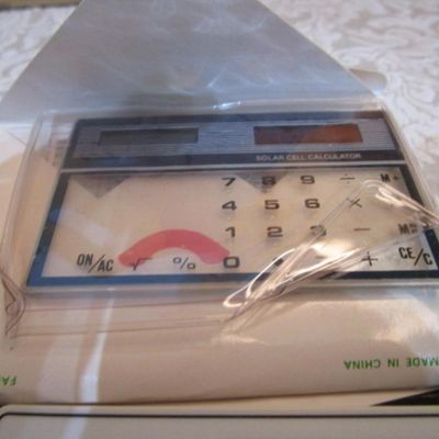 Sale Photo Thumbnail #279: 6 new solar credit card calculators with cases, 2 PF calculators, 1 Elsemate has a stopwatch, calculator & alarm (needs battery), Sharp EL8140 wallet calculator needs battery), see pictures