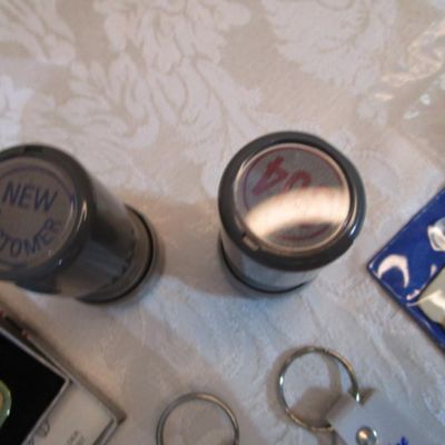 Sale Photo Thumbnail #316: 2 rubber stamps, pocket sewing kit, 31 Vintage keychains (one opens to a magnifying glass and is new), 1 badge holder, see pictures