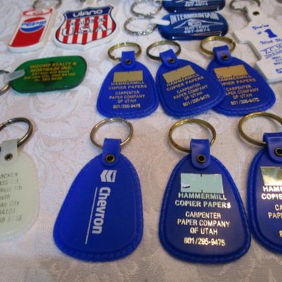 Sale Photo Thumbnail #319: 2 rubber stamps, pocket sewing kit, 31 Vintage keychains (one opens to a magnifying glass and is new), 1 badge holder, see pictures