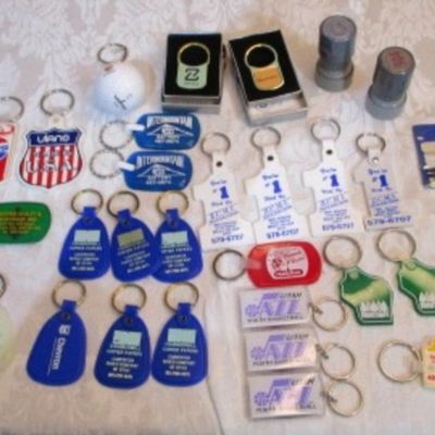 Sale Photo Thumbnail #311: 2 rubber stamps, pocket sewing kit, 31 Vintage keychains (one opens to a magnifying glass and is new), 1 badge holder, see pictures
