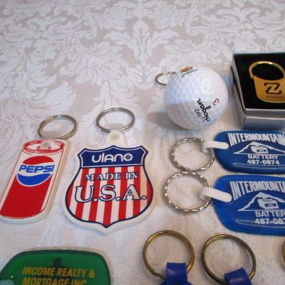 Sale Photo Thumbnail #318: 2 rubber stamps, pocket sewing kit, 31 Vintage keychains (one opens to a magnifying glass and is new), 1 badge holder, see pictures