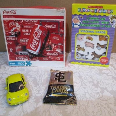 Sale Photo Thumbnail #333: Coca-Cola puzzle 1000 pieces, Hands Learning Stacking cards, Maisto VW toy car 1:37 scale & doors open , Salt Lake Bees trading cards 2016 new unopened