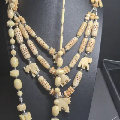 Sale Photo Thumbnail #76: VTG Beaded Carved ? Resin ? Elephants 27" Long Necklace & single bead carved Necklace
> elephant necklace is 4 strands w/j hook clasp
> single bead necklace is 18" w/ silver spacers and magnetic clasp
Both in excellent condition