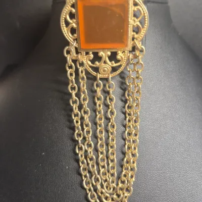 Sale Photo Thumbnail #98: Vintage Gold tone Dangle fancy square shape Brooch
size: 4.5 x 1.5"
pin perfect, no chain mold