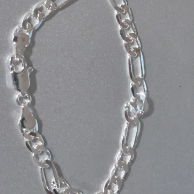Sale Photo Thumbnail #136: UK Genuine 925 Sterling Silver 7mm Figaro Link Bracelet, marked 925, Rhodium finished, allergy free
Width: 7mm
Length: 8 Inch