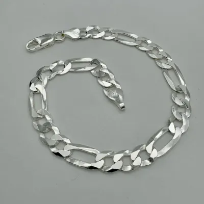 Sale Photo Thumbnail #135: UK Genuine 925 Sterling Silver 7mm Figaro Link Bracelet, marked 925, Rhodium finished, allergy free
Width: 7mm
Length: 8 Inch