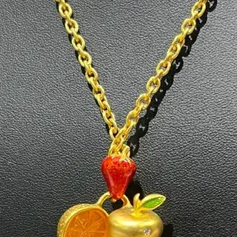 Sale Photo Thumbnail #235: Bob Macky Women's Jewelry - Gold – fruit platter gold tone necklace 
> on a gold curb chain 12" total length
> marked on reverside of pendent