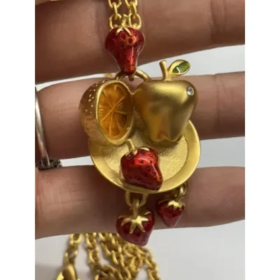Sale Photo Thumbnail #239: Bob Macky Women's Jewelry - Gold – fruit platter gold tone necklace 
> on a gold curb chain 12" total length
> marked on reverside of pendent