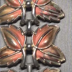 Sale Photo Thumbnail #250: Pair MCM Bracelets ~ Lucite Thermo & Thermoset Butterfly-leaf 
> blue lucite thermoset plastic leaf w/gold foundation and snap click clasp
> coral pink thermoset butterfly design
both great MCM designs