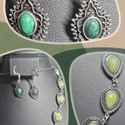 Sale Photo Thumbnail #86: Silvertone marcasite jewelry set includes a necklace, and earrings featuring aventurine stones. The pieces are adorned with marcasite stones, giving them a unique and stylish look.  Lobster clasp and 3" extenetion
Earrings marked 925 on pierced loops