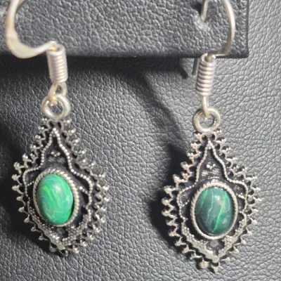 Sale Photo Thumbnail #88: Silvertone marcasite jewelry set includes a necklace, and earrings featuring aventurine stones. The pieces are adorned with marcasite stones, giving them a unique and stylish look.  Lobster clasp and 3" extenetion
Earrings marked 925 on pierced loops
