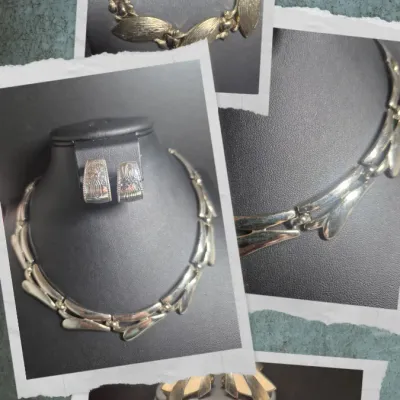 Sale Photo Thumbnail #102: Two Vintage Sets MONET Necklaces & Earrings to match [2 sets]
< gold tone set  & Silver tone set
> both have earrings that coordinate