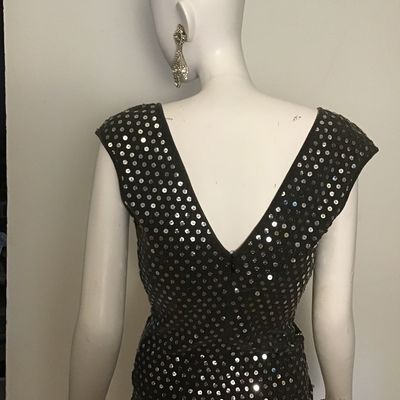 JIMMY GAMBA
Beautiful stretch sequined top.
MINT!
