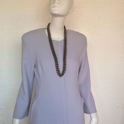 GIRGIO ARMANI COLLECTIONE.
MINT

I have many of his pantsuits, pants and dresses!!All in MINT condition.