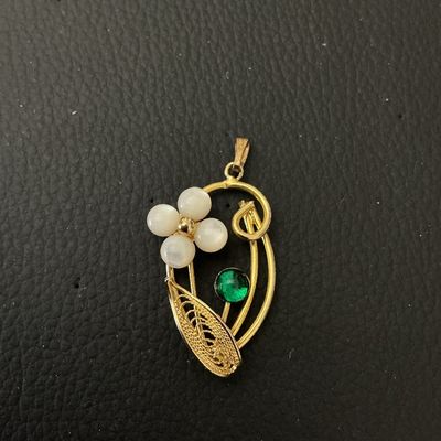 Vintage Gold Tone Floral Pendant with Pearl-Style Accents and Green Stone