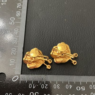 Vintage Gold Tone Floral Screw-Back Earrings Stamped B.N.