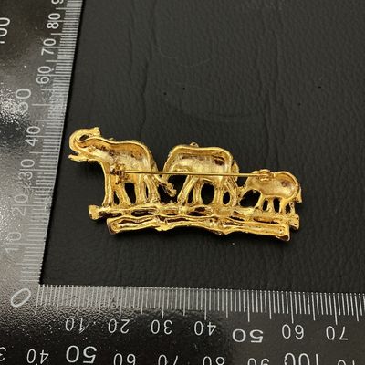 Gold-Tone Elephant Family Brooch with Rhinestones and Glitter Detail