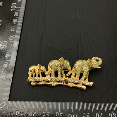 Gold-Tone Elephant Family Brooch with Rhinestones and Glitter Detail