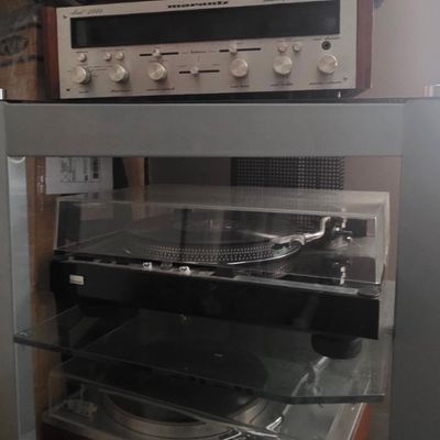 Sale Photo Thumbnail #27: Vintage Marantz stereophonic receiver paired with multiple turntables housed in a multi-shelf audio component rack.