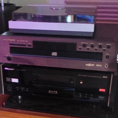 Sale Photo Thumbnail #49: Stack of vintage home audio equipment including a Pioneer Elite receiver, Marantz CD player, and a turntable on top.