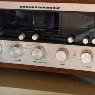 Sale Photo Thumbnail #82: Vintage Marantz Model 4230 stereo quadradial receiver in a wooden case, featuring classic silver faceplate knobs and gyro-touch tuning wheel.