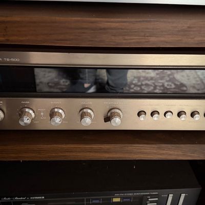 Sale Photo Thumbnail #171: Vintage Sanyo TS-500 automatic 4-channel receiver housed in a wooden stereo cabinet.