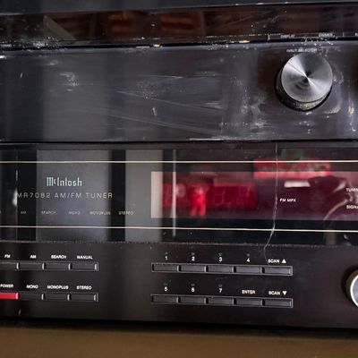 Sale Photo Thumbnail #174: Vintage McIntosh MR 7082 AM/FM tuner stacked under a modern Sony STR-DH190 stereo receiver, both showing light surface dust.