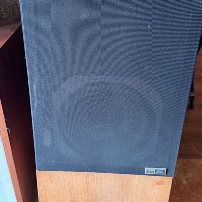 Sale Photo Thumbnail #184: Vintage ESS AMT floor-standing speaker featuring a wooden base cabinet and black fabric mesh grille.