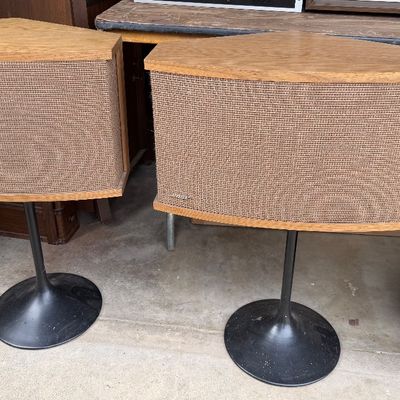 Sale Photo Thumbnail #185: Pair of vintage Bose 901 Direct/Reflecting speakers in wood cabinets on black tulip metal pedestal bases.