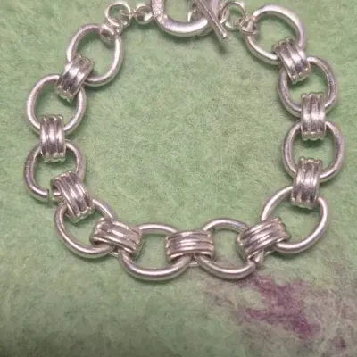 Chaps silver tone link bracelet with toggle clasp