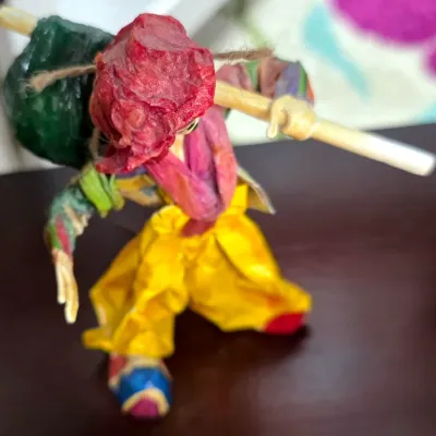 Sale Photo Thumbnail #97: Handcrafted Mexican dried corn husk folk art figurine depicting a traveler carrying a pack.