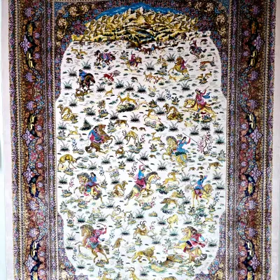 Sale Photo Thumbnail #131: Intricately woven Persian pictorial rug featuring a detailed hunting scene with horseback riders and wildlife set against a mountain backdrop.