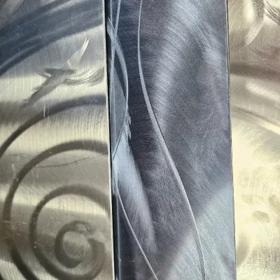 Sale Photo Thumbnail #392: Abstract contemporary metal wall art panels with brushed and swirled textures.