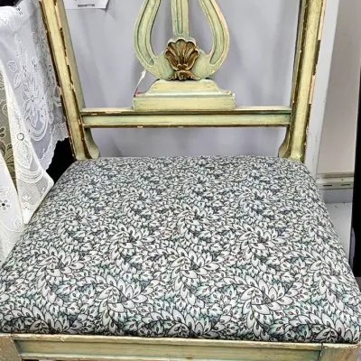 Sale Photo Thumbnail #429: Neoclassical style lyre-back dining chair featuring a distressed pale green painted finish with gold accents and patterned upholstery.