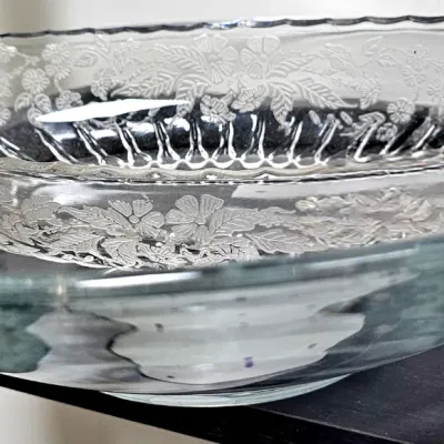 Sale Photo Thumbnail #486: Vintage clear pressed glass serving bowl featuring an etched floral band and scalloped rim.