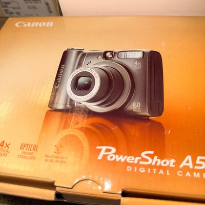 Sale Photo Thumbnail #28: Original box for a Canon PowerShot A590 IS 8.0 megapixel digital camera.