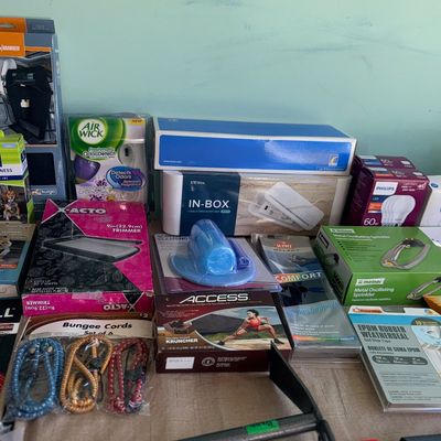 Sale Photo Thumbnail #90: Assortment of boxed household, lawn, and organizer items, including an X-Acto trimmer, bungee cords, Melnor sprinkler, and garden hand tool.