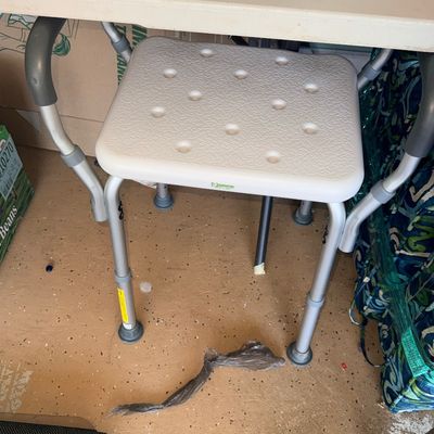 Sale Photo Thumbnail #125: Essential Medical Supply shower chair with adjustable aluminum legs and integrated side handles.