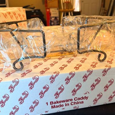 Sale Photo Thumbnail #167: Fantasia metal bakeware caddy, new in plastic wrapping and sitting atop its original box.