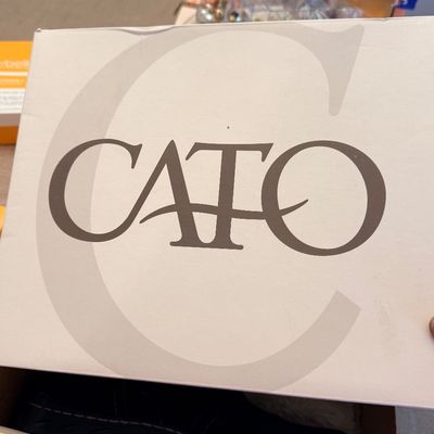 Sale Photo Thumbnail #214: Cato brand shoe box, showing the branded lid and black footwear inside.