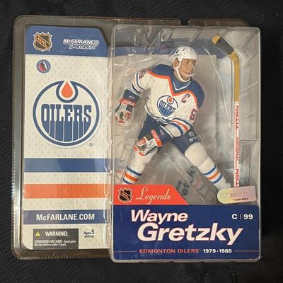 McFarlane's Sportspicks NHL Legends Wayne Gretzky action figure in original clamshell packaging, depicting him in his Edmonton...