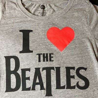 Grey heathered t-shirt featuring an "I Heart The Beatles" graphic print, in gently used condition.