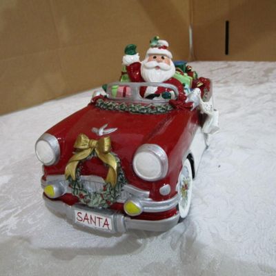 Sale Photo Thumbnail #246: Plays "Here Comes Santa Claus", 8-1/2" long x 4" wide x 5" tall, see pictures